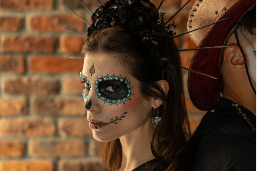 Woman with painted skeleton face for Halloween